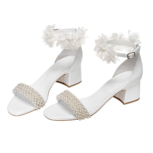 Handmade white bridal block heel sandals with pearl embellished front strap and floral ankle strap