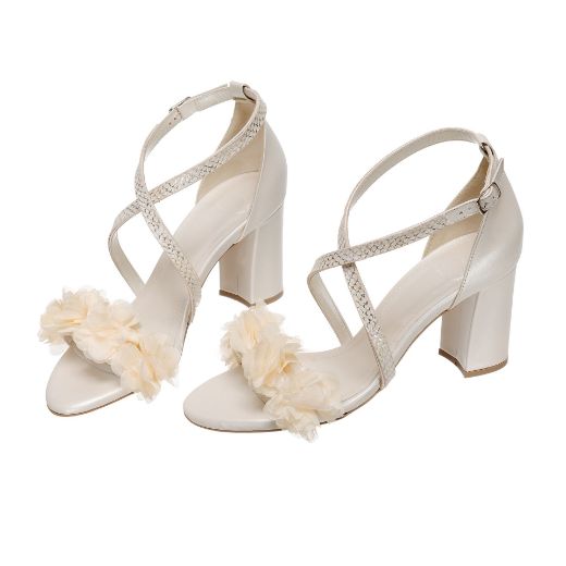 Handmade ivory bridal block heel sandals with ivory floral embellishments and crystal cross straps