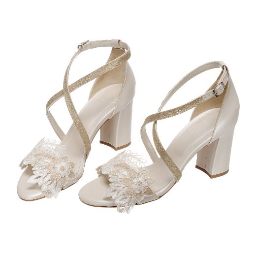 Handmade ivory bridal block heel sandals with embroidered lace and glitter cross straps