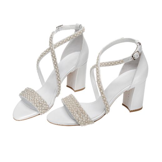 Handmade white bridal block heel sandals with pearl embellished front and cross straps