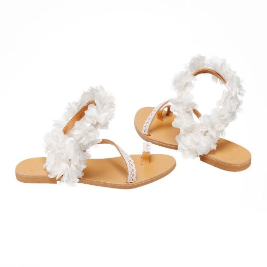 Handmade flat bridal sandals with white floral ankle detail