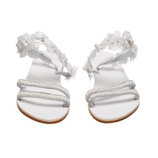 white bridal sandals with flowers and pearls