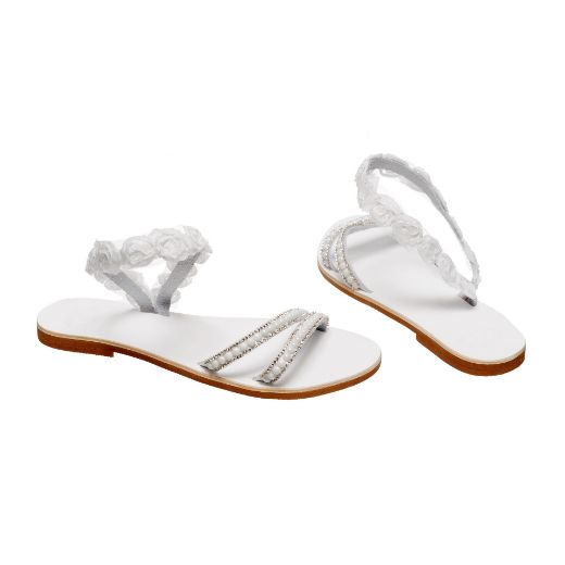 Handmade flat bridal sandals with floral ankle details and pearls