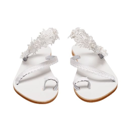 white bridal sandals with delicate lace embellishments