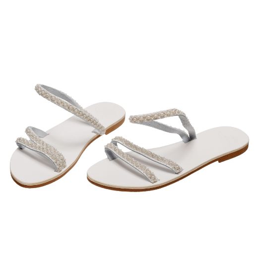 Handmade flat white wedding sandals with delicate pearl details