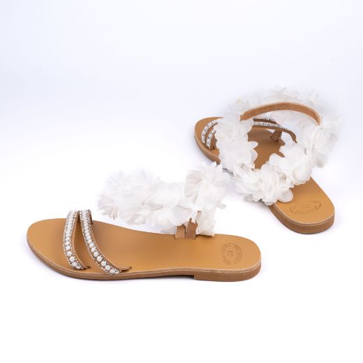 Handmade flat bridal sandals with floral ankle detail and white pearls