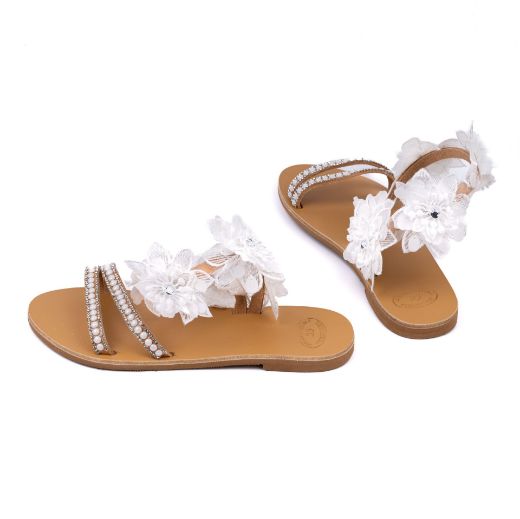 Handmade flat bridal sandals with floral ankle decoration and white pearls