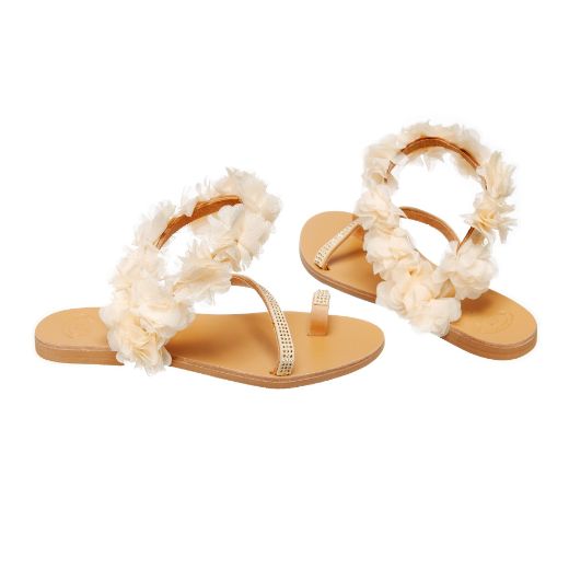Handmade flat bridal sandals with ivory floral ankle detail and pearl straps