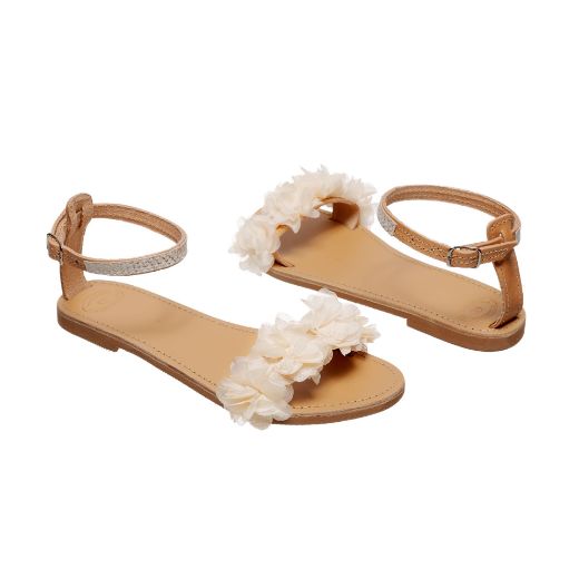Handmade flat bridal sandals with white flowers and lace ankle detail