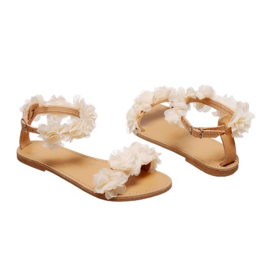 Handmade flat bridal sandals with ivory flowers on front and ankle straps