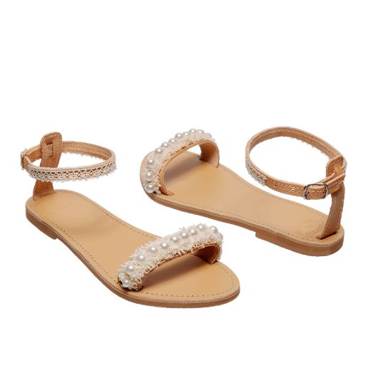Handmade flat bridal sandals with pearls at the front and lace around the ankle