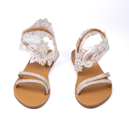 Handmade flat bridal sandals with ivory lace ankle detail and pearl straps