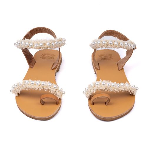 Handmade flat bridal sandals with ivory details and pearl embellished straps