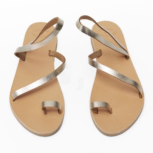 Women's metallic flat sandals with delicate leather straps
