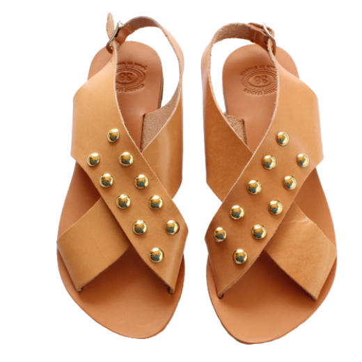 Handmade beige leather crossover sandals with gold metal studs