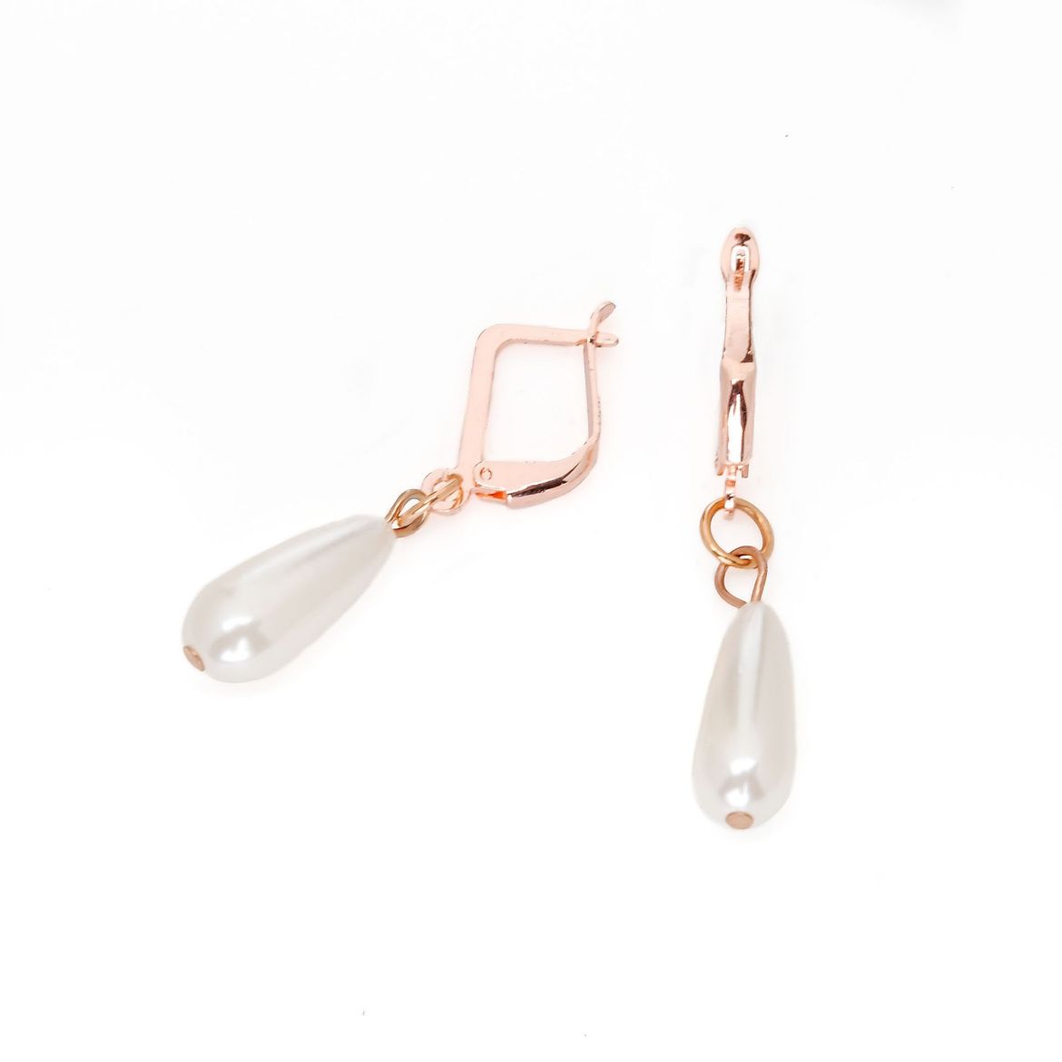 Rose gold tone drop earrings with pearl