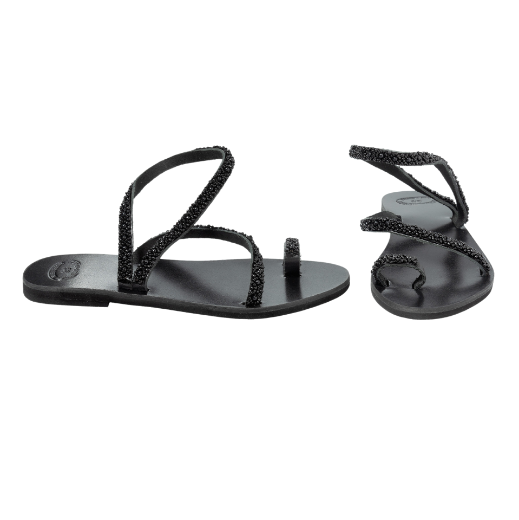 A black sandal with two upper straps, one plain and the other textured, and a loop for the toe.