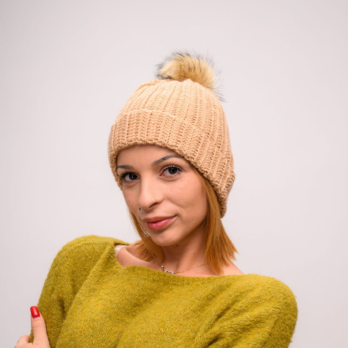 Picture of Crochet beanie beige faux fur pom