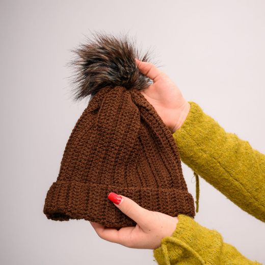 Picture of Handmade crochet beanie with faux fur pom in brown