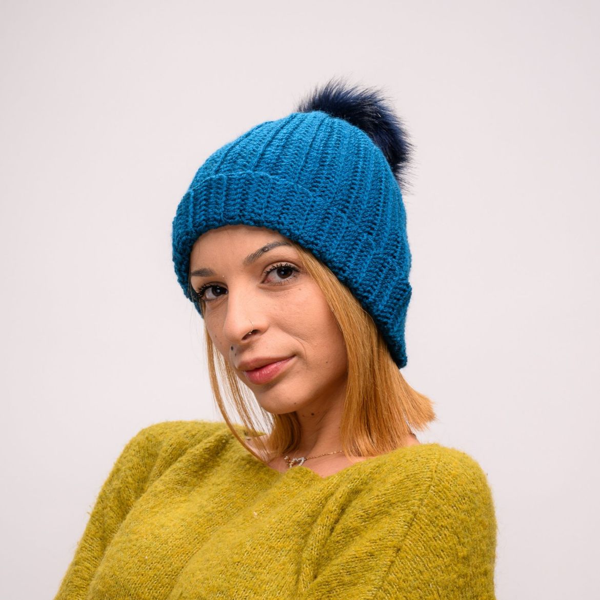 Picture of Crochet beanie petrol faux fur pom