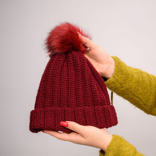 Picture of Handmade crochet beanie with faux fur pom in burgundy