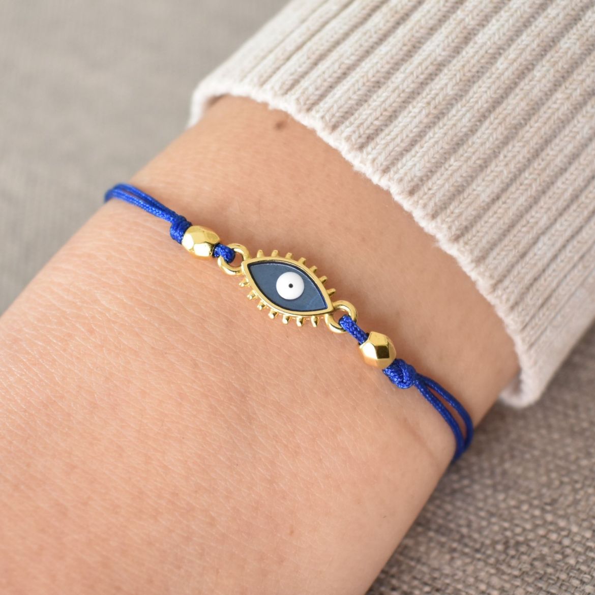 Picture of 24k gold plated evil eye bracelet with lashes