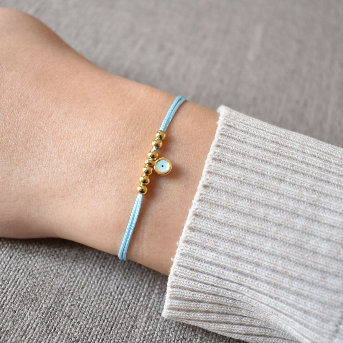 24k gold plated white evil eye bracelet with small beads