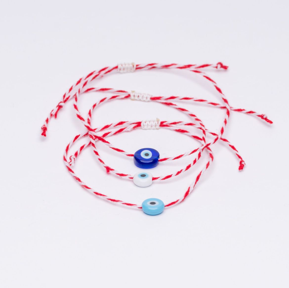 Μαρτάκι κόκκινο-λευκό κορδόνι με χάντρα μάτι – αντρικό μαρτάκι Μάρτης