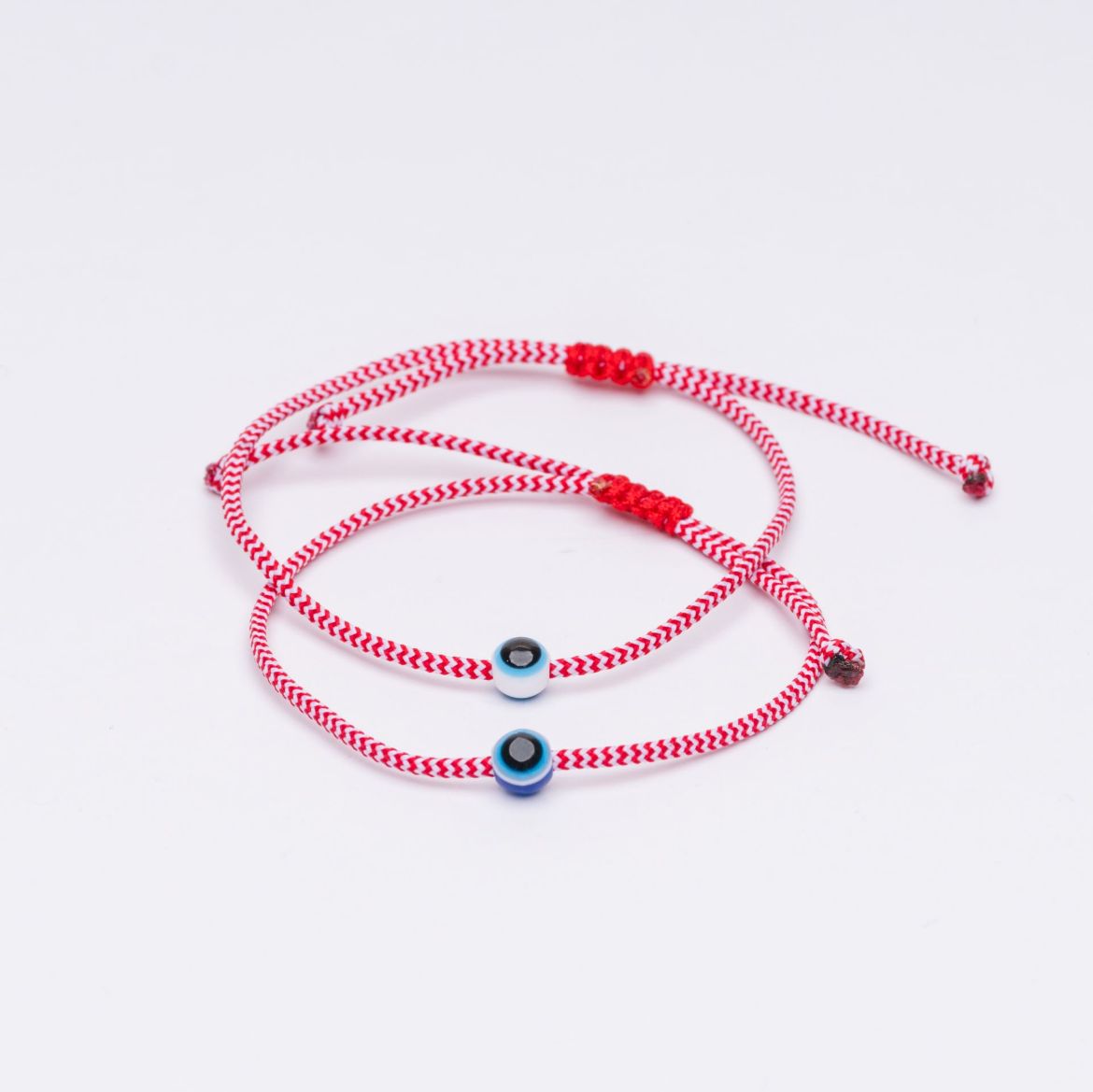 Μαρτάκι αντρικό κόκκινο-λευκό κορδόνι με χάντρα μάτι – μαρτάκι προστασίας Μάρτης