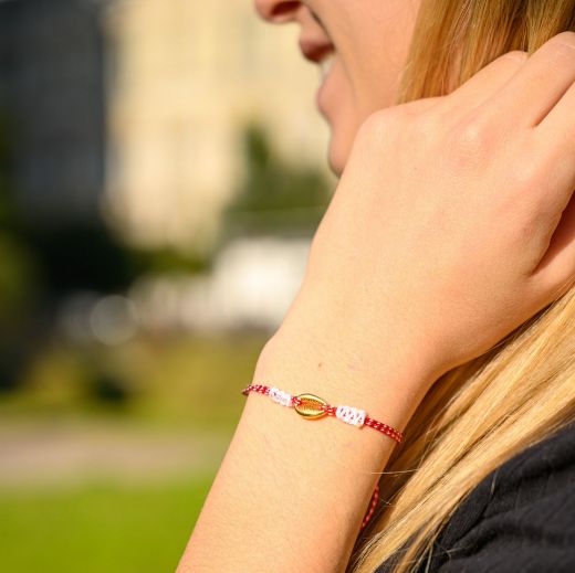 Greek martis bracelet with cowrie shell – red-white cord spring bracelet