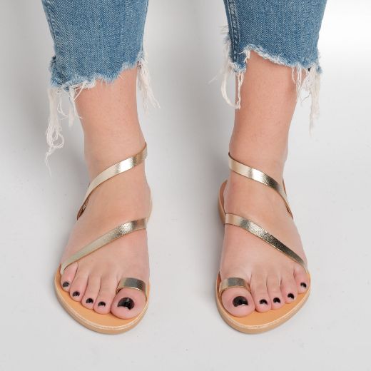 gold women's leather flat sandals with thin straps