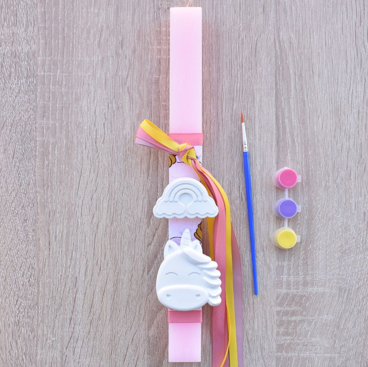 ροζ λαμπάδα για κορίτσι με διακοσμητικό μονόκερο σε παραμυθένιο ύφος, λαμπάδες κορίτσι