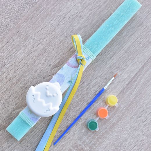 greek easter lambathes for child in mint green color with chick theme, orthodox easter candle for kids design