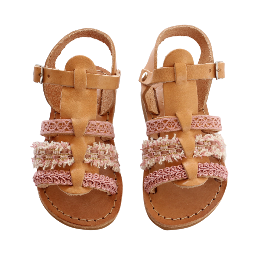 Handmade pink leather sandals with textured details