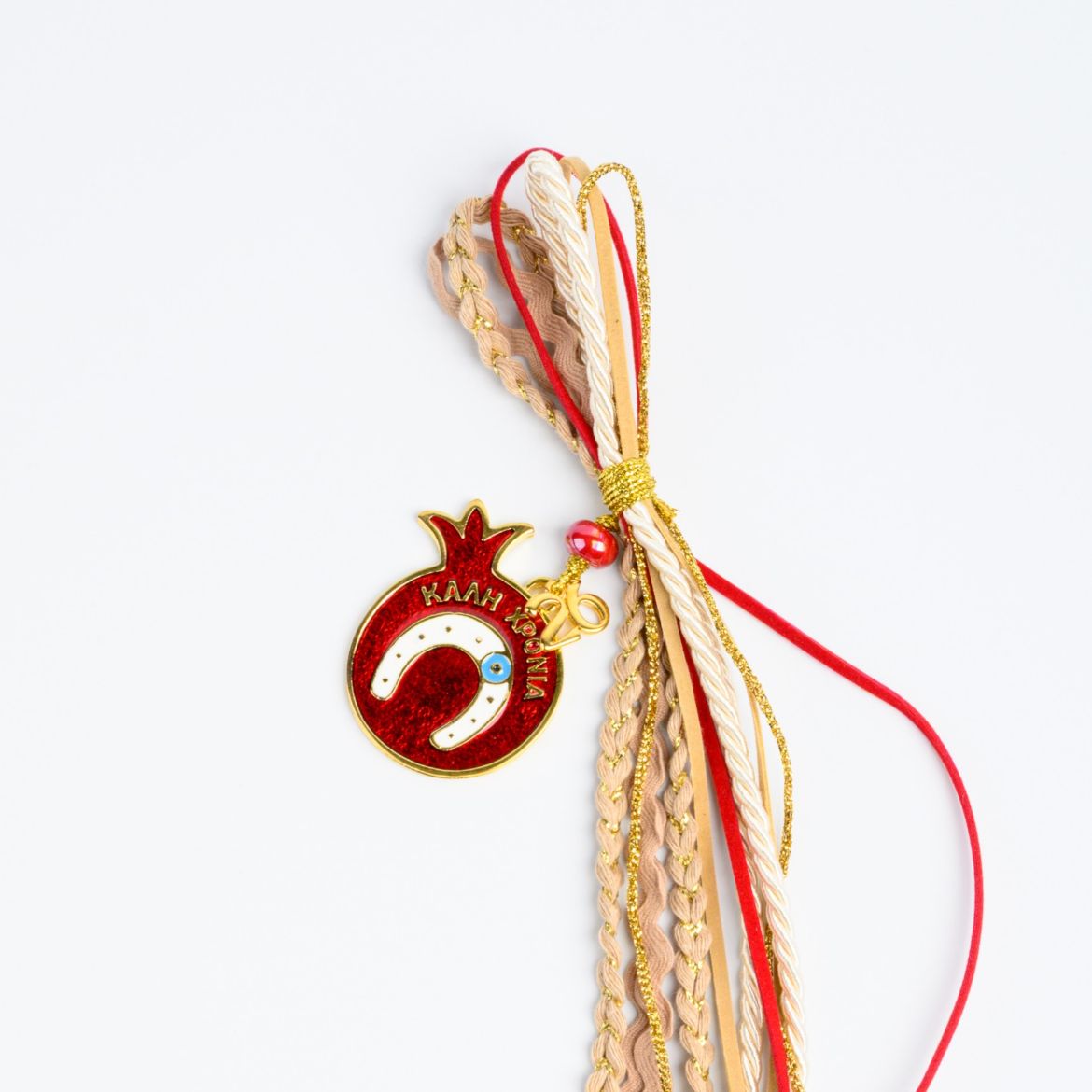 Picture of Red metal pomegranate hanging gouri 2027 with horseshoe